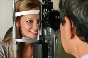 Eye Doctor giving an Eye Exam