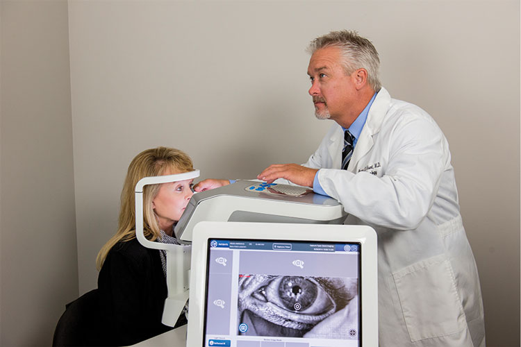 Eye Doctor working with a patient